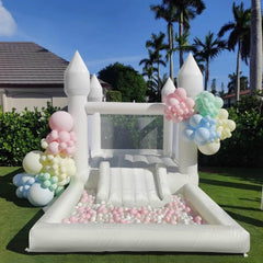 Inflatable White Bounce House for Kids with Ball Pool & Blower in a sunny backyard setting.