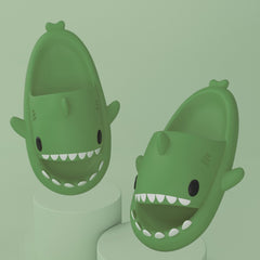 Cartoon Shark Slippers on a green pedestal, showcasing 4cm thick sole and playful shark design.