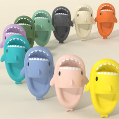 Cartoon Shark Slippers on a green pedestal, showcasing 4cm thick sole and playful shark design.