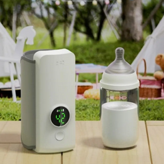 Baby Bottle Warmer - Portable & Wireless design with temperature settings and a baby bottle for easy feeding.