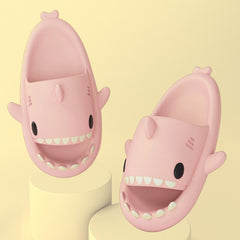 Cartoon Shark Slippers on a green pedestal, showcasing 4cm thick sole and playful shark design.