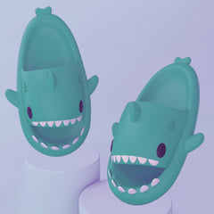 Cartoon Shark Slippers on a green pedestal, showcasing 4cm thick sole and playful shark design.